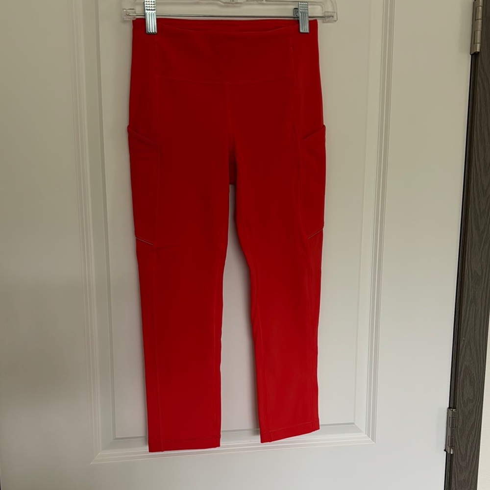 Lululemon Orange high waisted cropped leggings. Size 4. Pre-owned